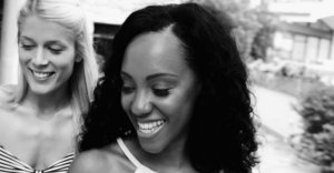 18 year old girl Megan Rain removes her sandals and then clothes to pose naked